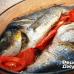 Si të piqni dorado në furrë në petë në mënyrë që filetoja e peshkut të jetë e shijshme dhe e lëngshme?