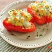 Pepper halves with chicken and vegetables in the oven Stuffed pepper halves in the oven